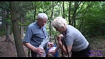 The young girl meets an elderly married couple fucking in the woods